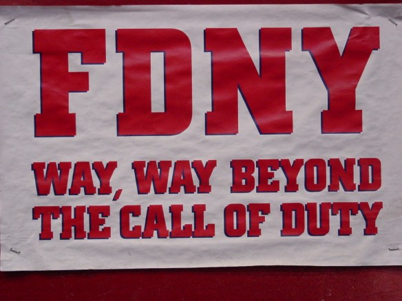 Sign at FDNY Engine 10 Ladder 10 house "FDNY WAY, WAY BEYOND THE CALL OF DUTY"